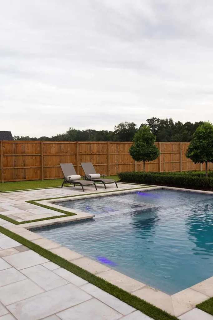 pool wooden fence patio chairs shelly project